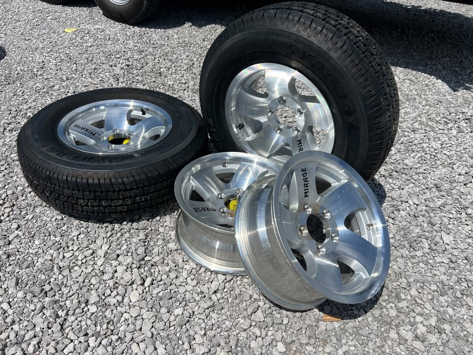 New Mirage 5 Lug Aluminum Rims With ST205/75R14 Tires